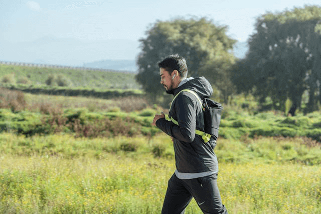 Runner wearing wireless headphones